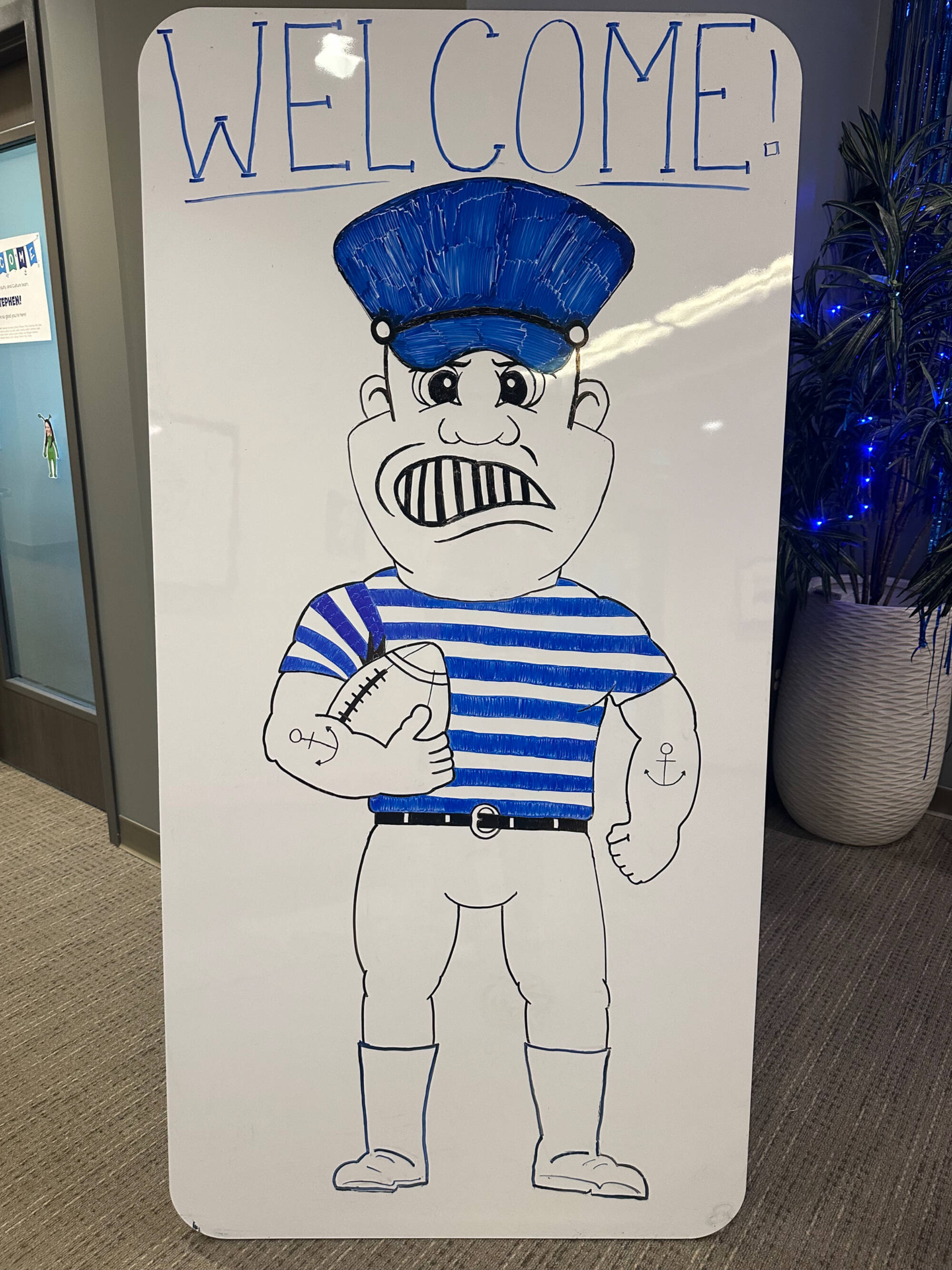Photo of Louie the Laker drawing